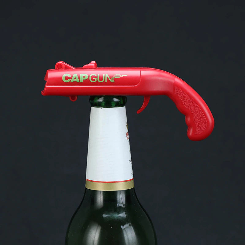 Abridor de Garrafas e Pistola de tampinhas CapGun